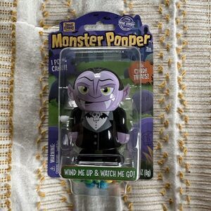 Novelty Wind Up Dracula Toy Treat Street Monster Pooper Poops Out Candy